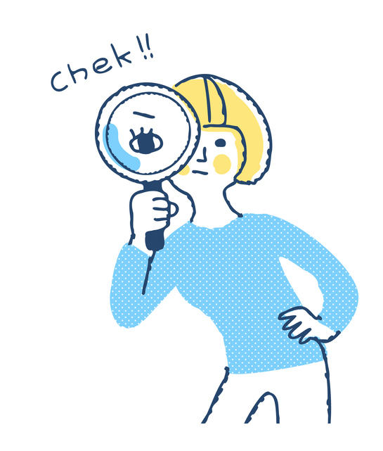 虫眼鏡を通して見ている若い女性