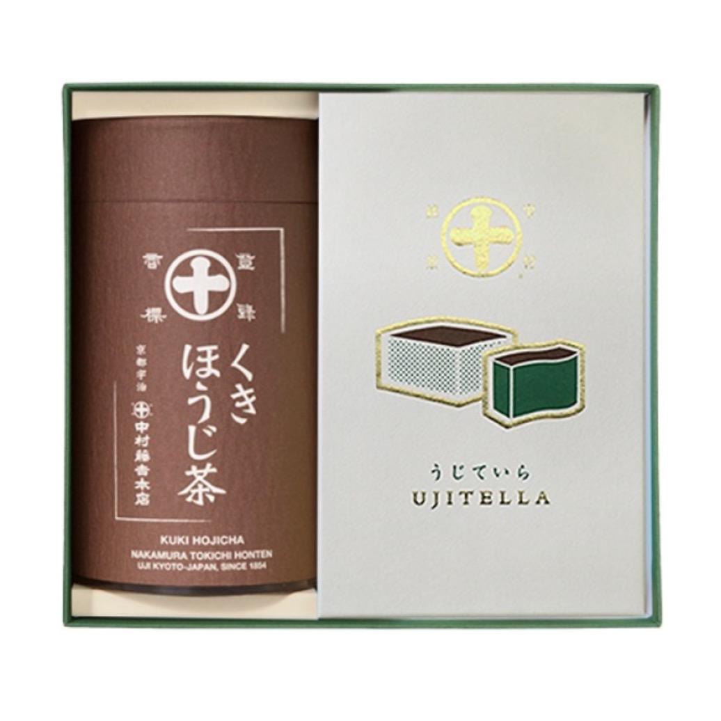 緑の化粧箱に入った茶色い茶筒と白い箱