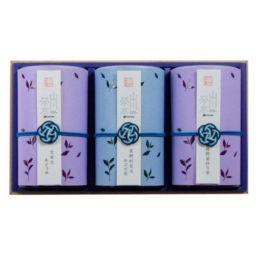 1箱の中に3つ並んだ紫色のパッケージ（お茶）