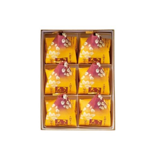 長方形の箱に黄色の包装紙で包まれた菓子が6個詰められている