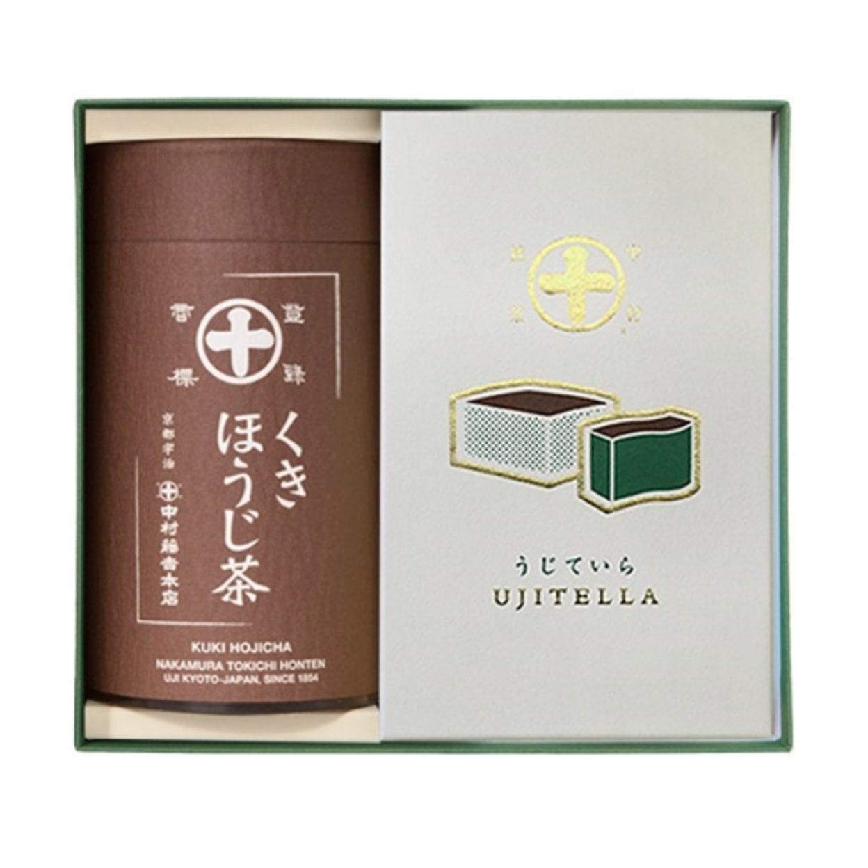 白と緑のボックスに入ったほうじ茶が入った茶色の茶筒と白の箱に入ったカステラ