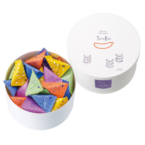 白い円形のボックスに、5種類の「タネビッツ」が詰め合わせになっている