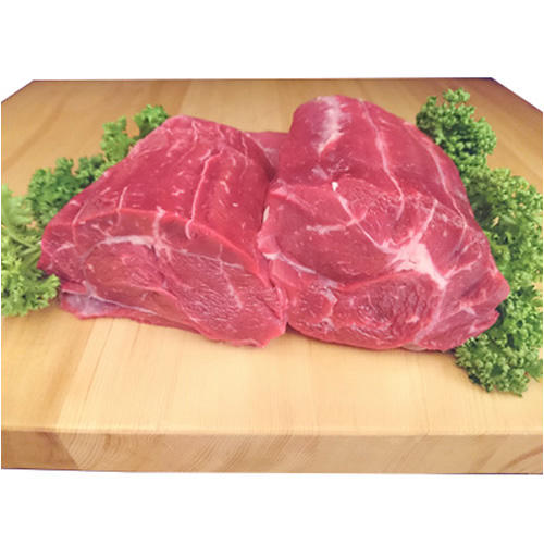 木の板の上にのった精肉専門店　つの田の「国内産黒毛和牛シチュー・カレー煮込み用ブロック(スネ)　1kg」