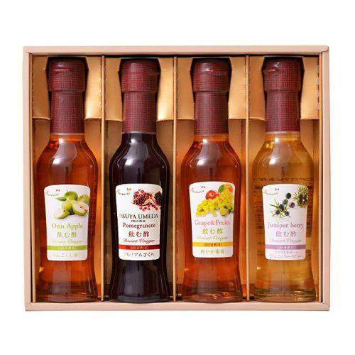 ビネガードリンク4本が贈答用の金色の箱に詰められている