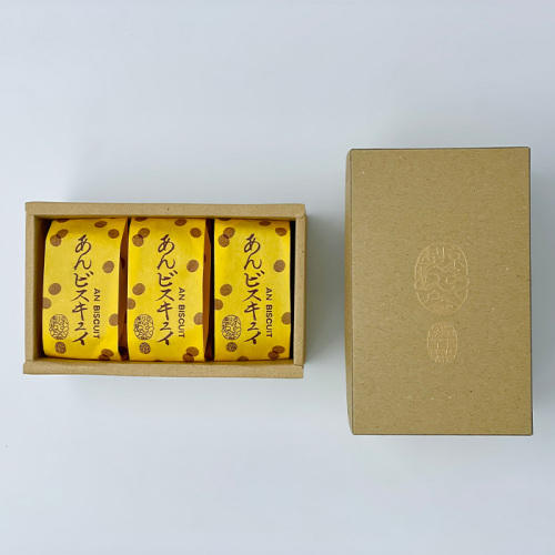 茶色い箱に入った黄色いパッケージのあんビスキュイ