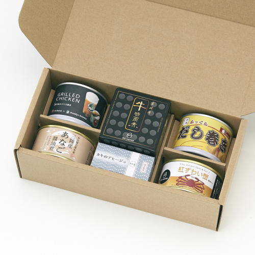 ベージュの箱に入ったミスターカンソ ショップ の缶詰セット
