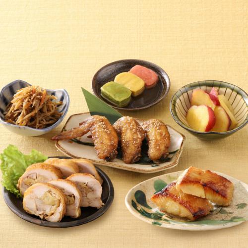 ベージュの皿にのったまつおかの「(冷凍)おすすめ惣菜セット」