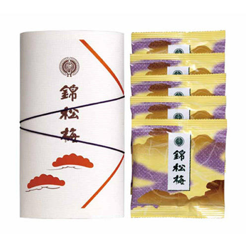 佃煮ふりかけが入った小袋と、その外箱が置かれている